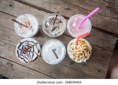 Ice Coffee Take Away On Wooden Background