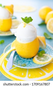 Ice cold lemon sorbet with fresh mint leaves