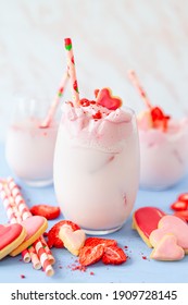 Ice cold milk shake with cream and dried stawberries