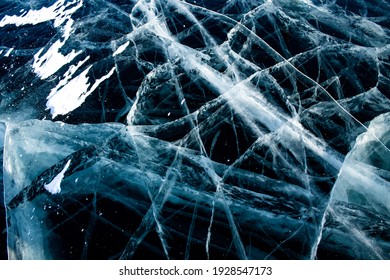 Ice Cracks On Frozen Lake