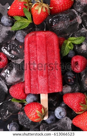 Similar – Foto Bild Erdbeer-Popsicle auf schwarzem Stein