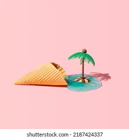 Ice Cream Cone, Blue Jelly, Striped Cookie And Palm Tree, Creative Summer Holiday Arrangement On Pastel Pink Background. 