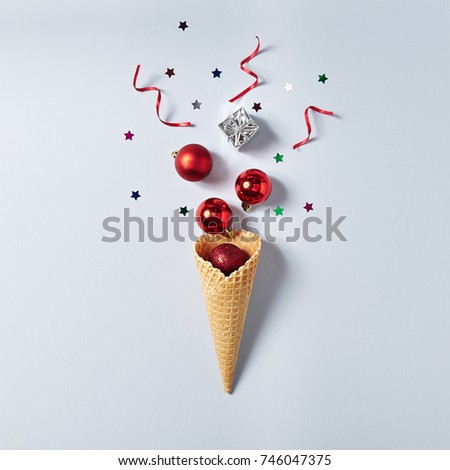 Ice Cream Cone with Christmas Decoration. Minimal Christmas Concept. Flat Lay