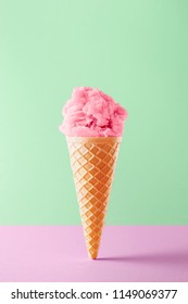 Ice cream cone isolated on a colorful background. Copy space. Vivid colors