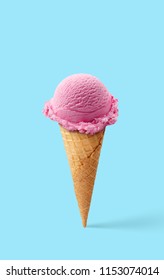 Ice cream cone vanilla and strawberry flavors on a blue background.