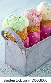 Ice Cream Cones In An Metal Basket In Light Blue Shabby Chic Vintage Background