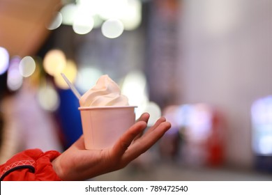 Ice Cream Cup In The Hands Of A Boy.