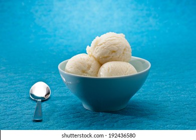 Ice Cream cup isolated over blue background