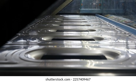 ice cream freezer. metal ice cube tray - Shutterstock ID 2257409467