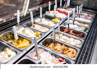 Ice Cream Frozen Yogurt Colorful Serving Counter Parlour With Many Scoopable Flavors, Sorbet, Chocolate, Toppings, Coffee