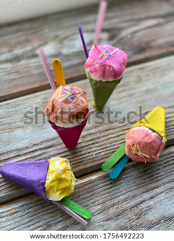 ice cream made of cardboard and paper, for children's play.