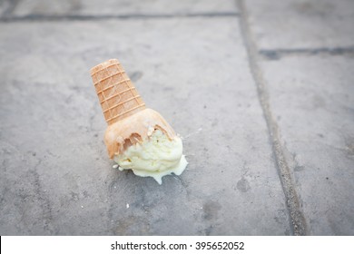 Ice cream on the ground. (selective focus)