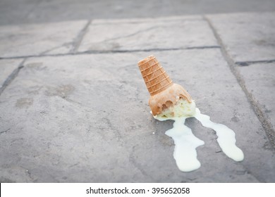 Ice cream on the ground. (selective focus)