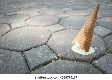 Ice cream on the ground. selective focus. soft focus.