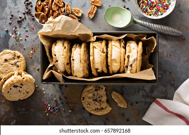 Ice Cream Sandwiches With Nuts And Caramel And Chocolate Chip Cookies Overhead Shot