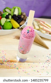 Ice Cream Scoops In Tall Dessert Glass. 