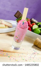 Ice Cream Scoops In Tall Dessert Glass. 