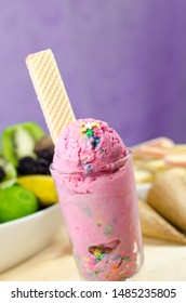 Ice Cream Scoops In Tall Dessert Glass. 