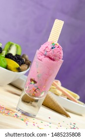 Ice Cream Scoops In Tall Dessert Glass. 