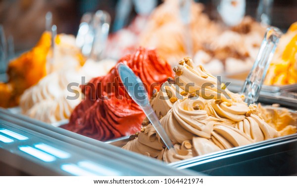 Ice cream\
in showcase fridge at confectionery\
shop