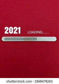 Ice Cream Stick symbol loading waiting for next year 2021 isolated with red background. - Shutterstock ID 1868478265