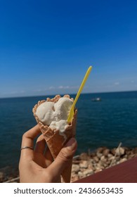 Ice cream summer beach, chilling relaxing sunbathing with clear blue sky, turquoise sea water and the sound of wave on sunny holidays.
