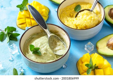 Ice Cream, Summer Sweet Snack Or Dessert. Homemade Avocado And Mango Fruit Ice Cream, Tropical Fruit Sorbet On A Stone Table.