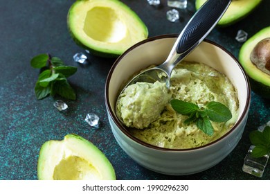 Ice Cream, Sweet Snack Or Dessert. Homemade Avocado Fruit Ice Cream, Summer Tropical Fruit Sorbet On A Stone Table. 