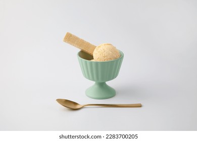 ice cream with wafer on dessert cup isolated on white background
