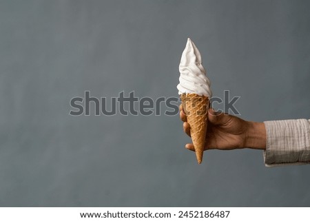 Similar – Child holds ice cream Ice