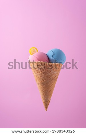 Similar – Ice cream cone with heart and moon shaped marshmallows on top