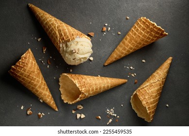 ice cream waffle cones on grey table, top view