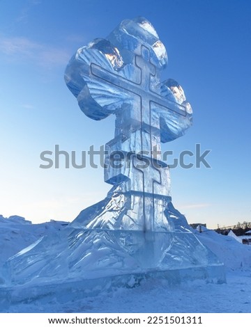 Ice cross in winter. Epiphany Orthodox holiday on a place of ice-hole swimming. Russia