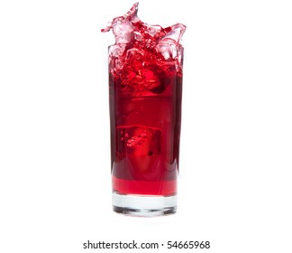 An Ice Cube Splashes Into Cold Cranberry Juice