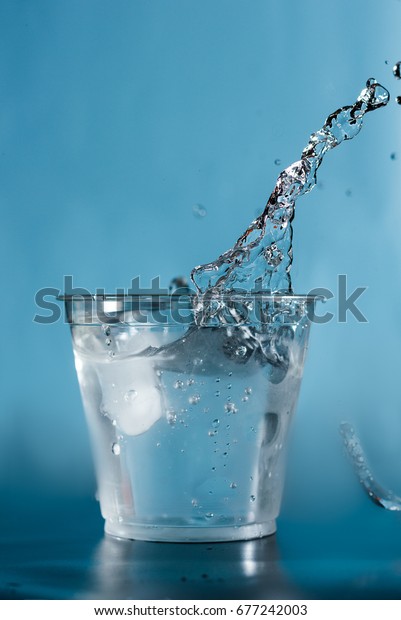Ice Cube Splashing Clear Cup Water Stock Photo Edit Now