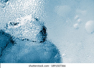 Ice cubes as background texture closeup photo