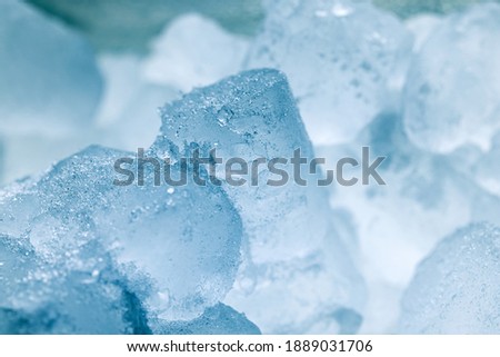 Ice cubes as background texture closeup photo