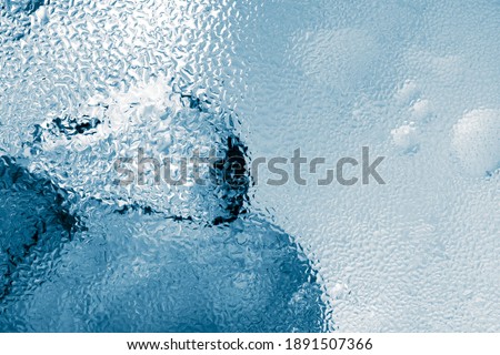 Ice cubes as background texture closeup photo
