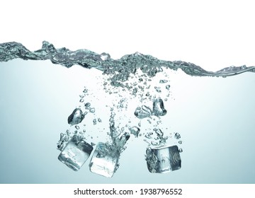 Ice Cubes In Clear Water With Splash And Air Bubbles