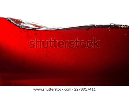 Ice cubes in cola beverage, close up,Detail of Cold Bubbly Carbonated Soft Drink with Ice 