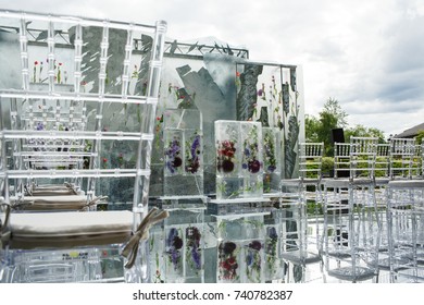 Ice Cubes With Colorful Flowers Make A Wedding Altar On The Backyard