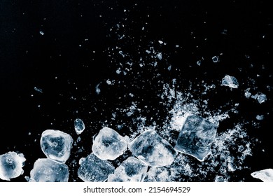 Ice Cubes Crush On Black Background. Chill Backdrop.