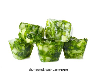 Ice cubes with cucumber slices and herbs on white background - Powered by Shutterstock