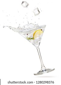 Ice Cubes Falling Into A Gin Martini Cocktail Splashing On White Background