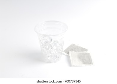 The  Ice Cubes At The Plastic Of Cup Tea Bag