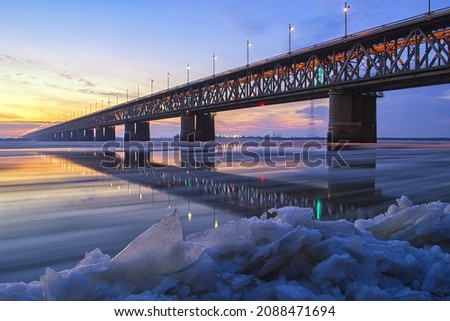 Ice drift on the Amur river. Motion blur. Khabarovsk, Amur bridge area, Trans Siberian railway. Far East, Russia.