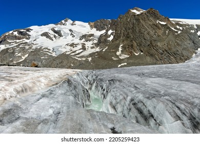 Ice Field On The Great Aletsch Glacier With Crevasse, Bernese Oberland, Switzerland