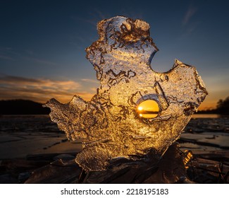 Ice Formation On Shoreline At Sunset