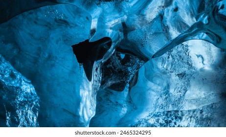 The ice formations at Vatnajökull's Blue Ice Cave display mesmerizing textures and shapes, revealing the captivating beauty of Iceland's glacial landscapes. - Powered by Shutterstock