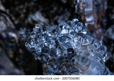 Ice formations on the rocks, macro view, nature background